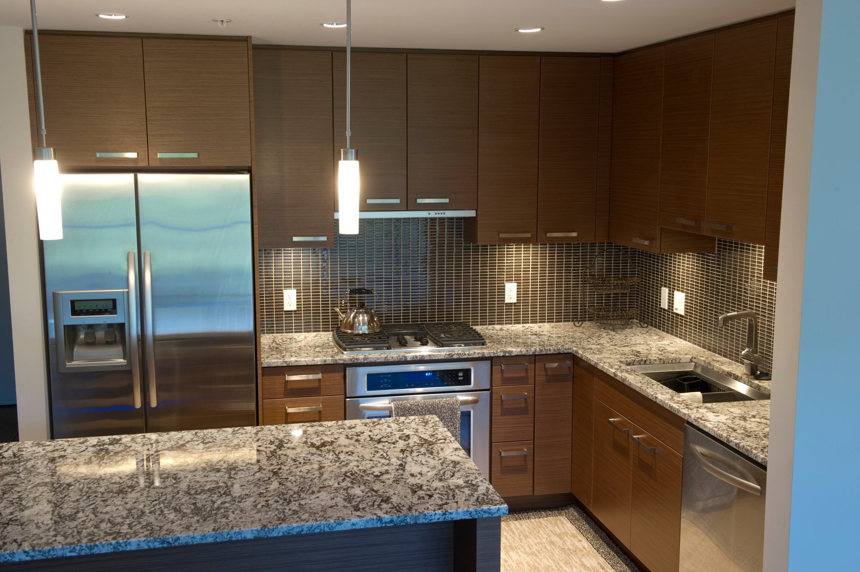 Large kitchen with Island with granite countertops